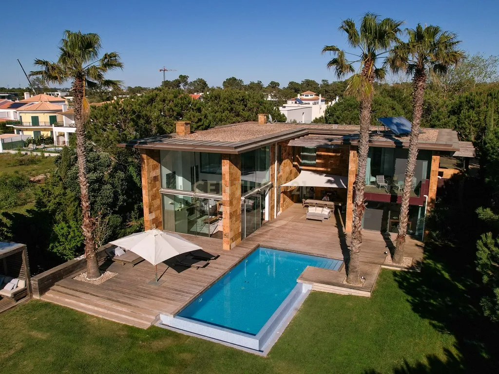 Moradia Exclusiva em Primeira Linha de Mar com Piscina Infinita / Tróia-Carvalhal - Image 1