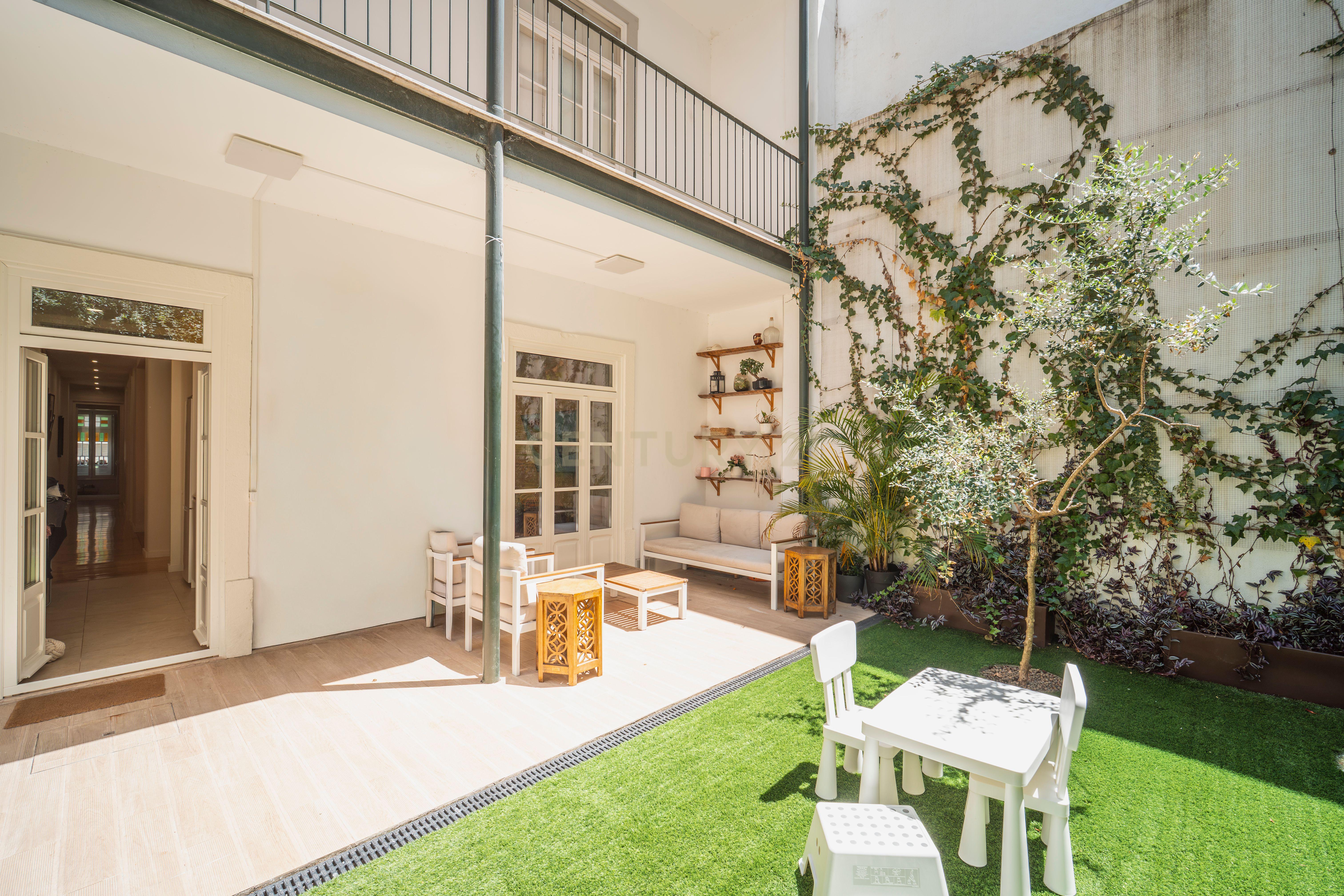 Fotografia 4 de Apartamento Encantador com Jardim Privativo — Santo António, Lisboa