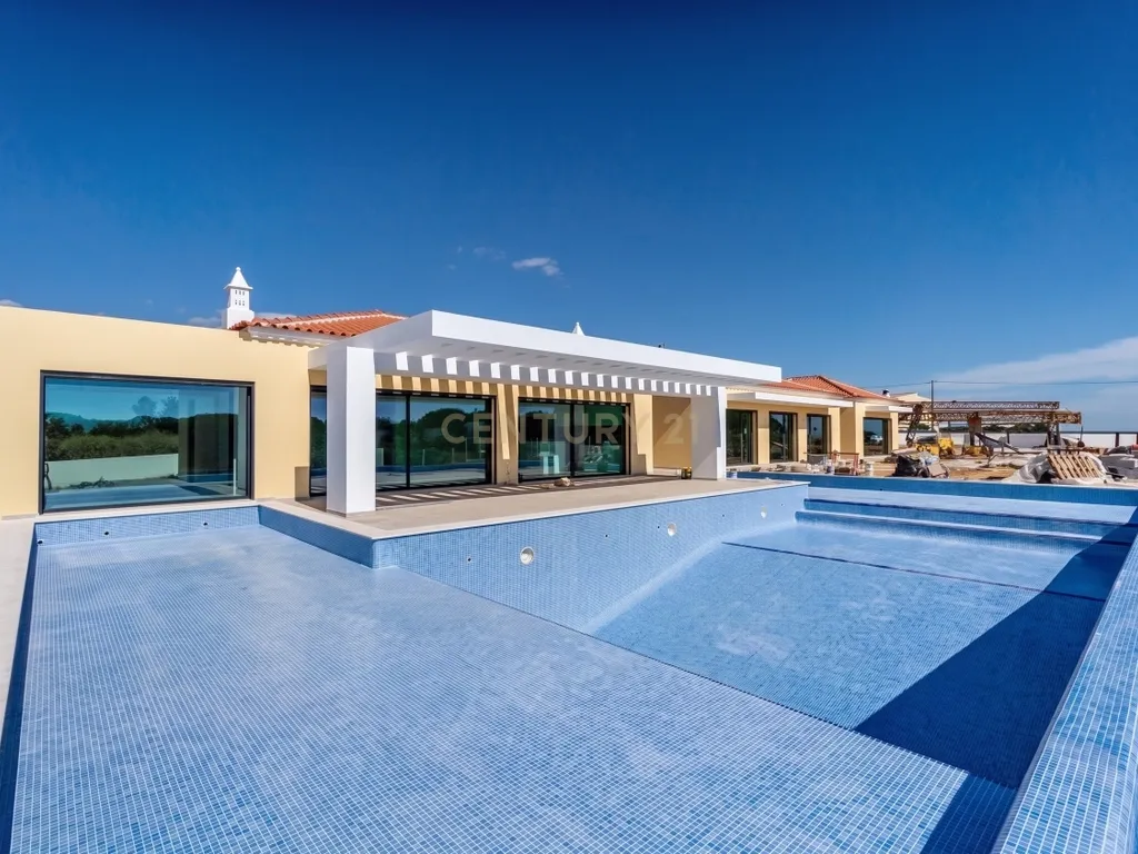 Moradia T4+1 de construção nova com piscina infinita | Caramujeira, Lagoa - Image 2