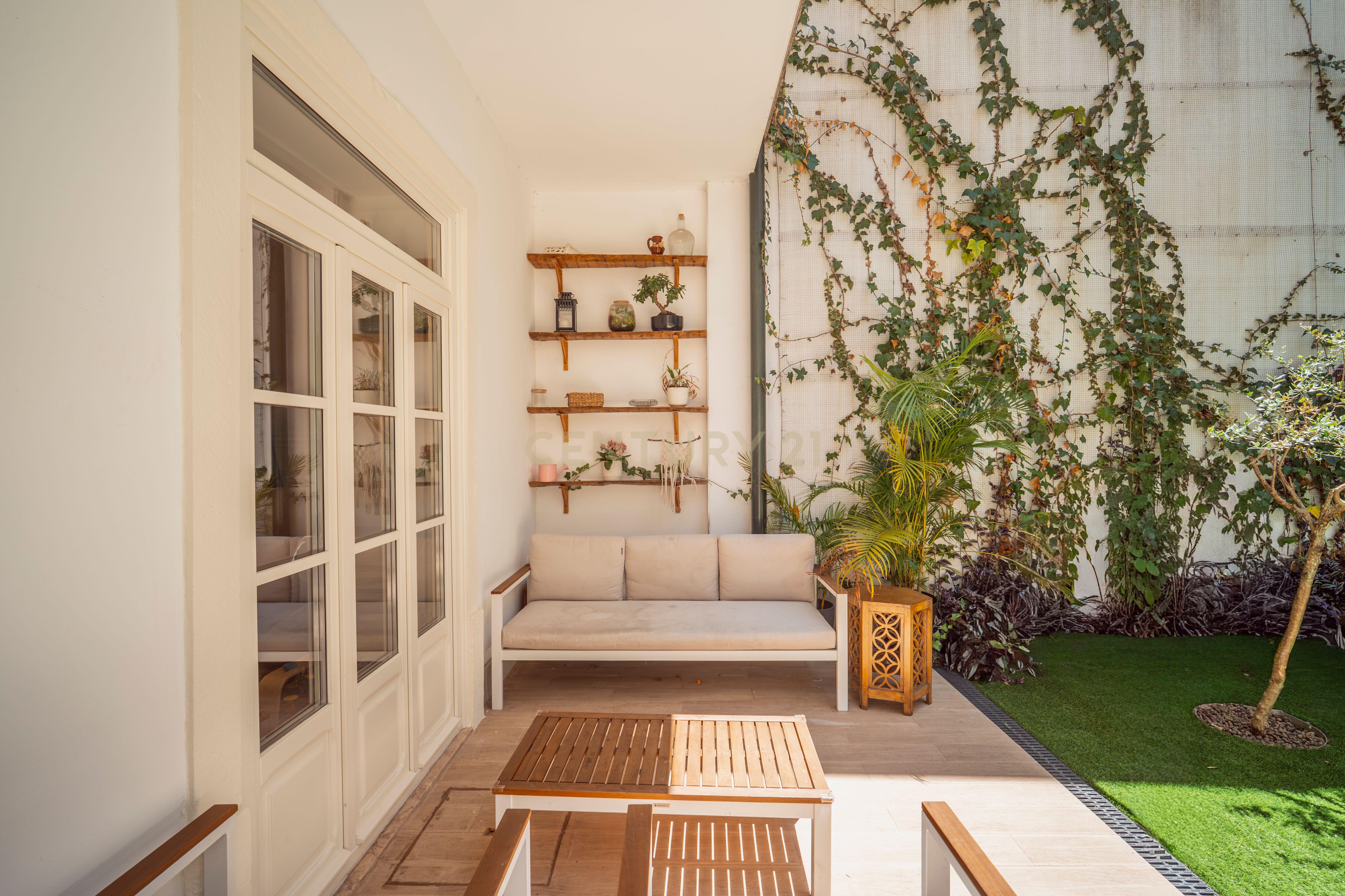 Fotografia 3 de Apartamento Encantador com Jardim Privativo — Santo António, Lisboa