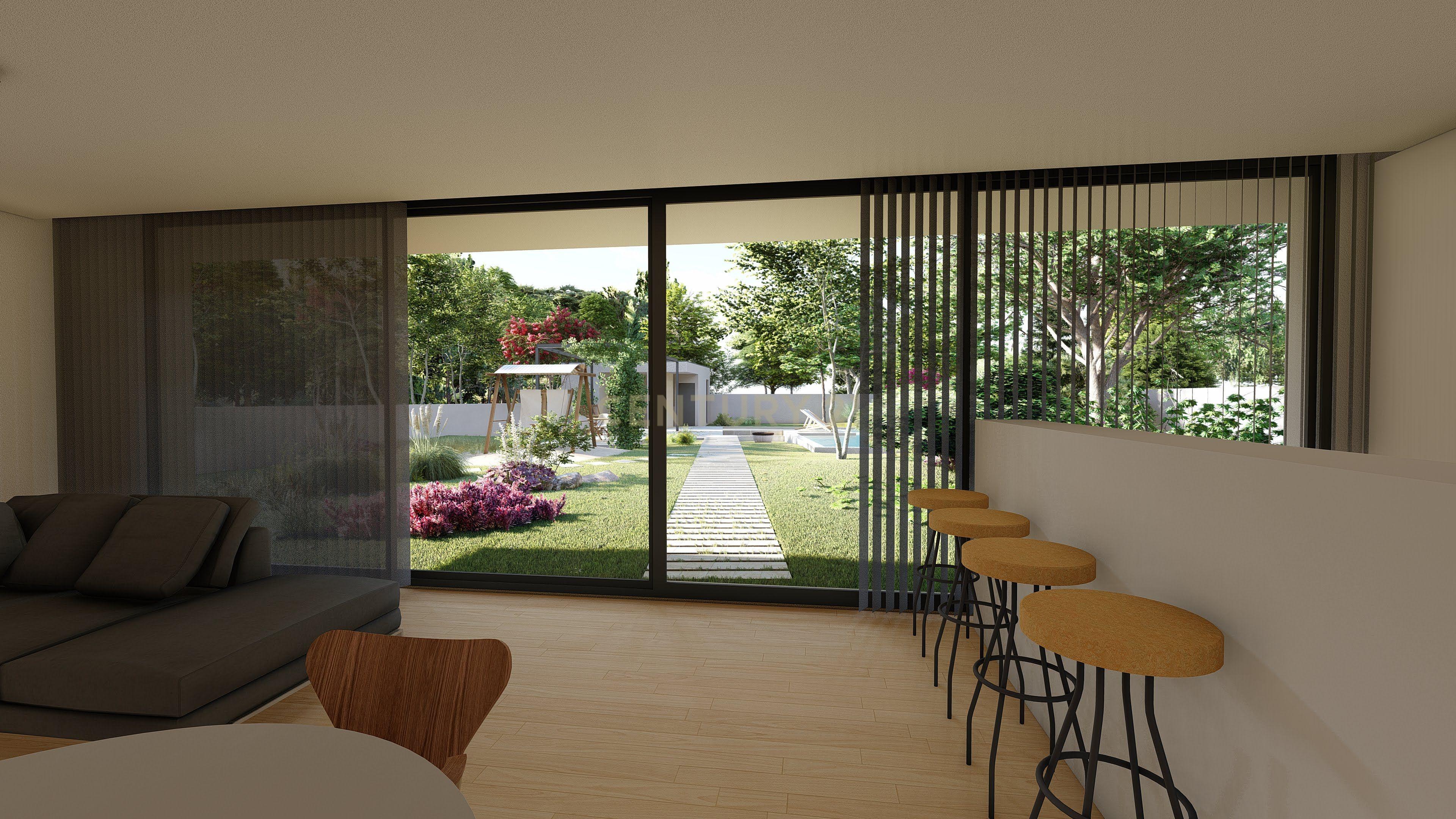 Fotografia 8 de Moradia Térrea com Piscina aquecida e excelente jardim. Localizada em Quintinhas, Seixal