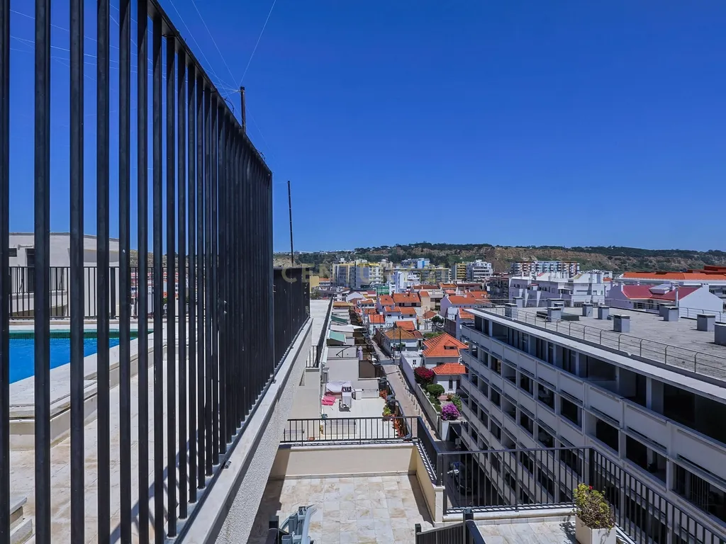T1 moderno com domótica e piscina – Costa da Caparica - Image 36