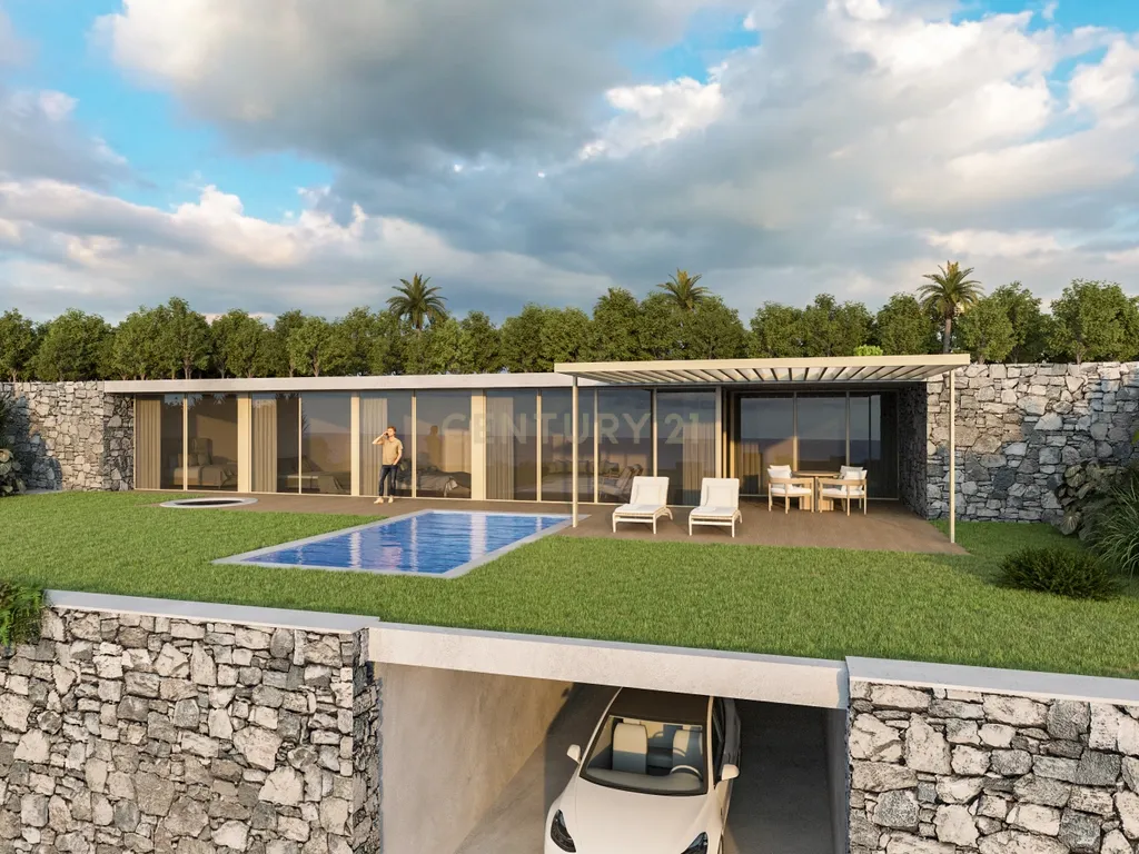 Exclusiva moradia T3 com vista mar. Uma jóia está à sua espera na Calheta - Image 1