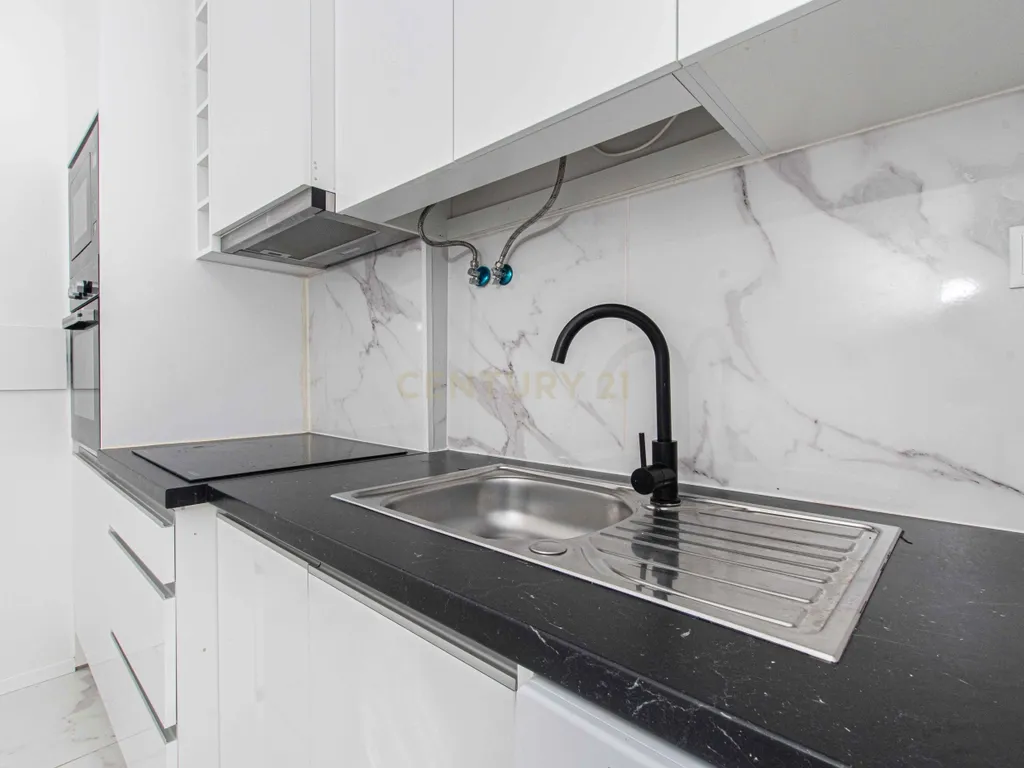 Apartamento T1 Renovado no Centro da Amadora - Image 15