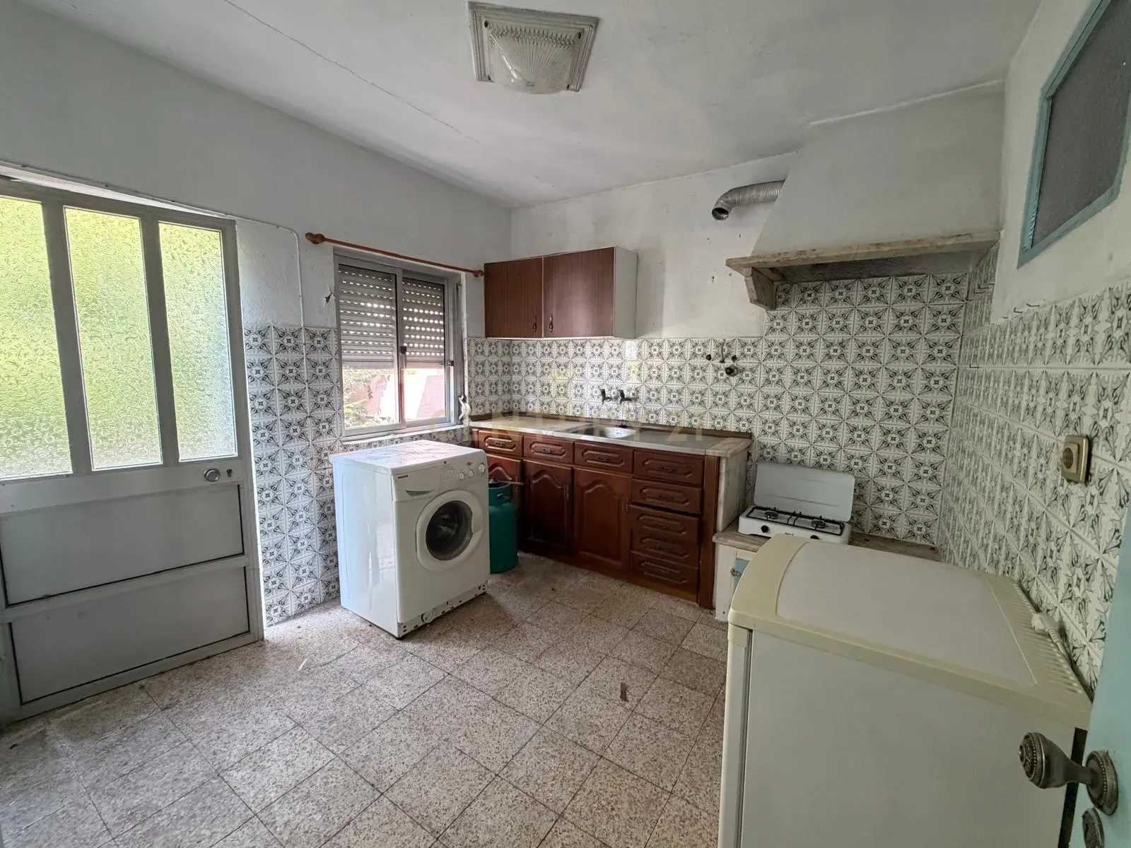 Fotografia 5 de Moradia T2 para Recuperação com Quintal – Excelente Oportunidade de Investimento no Pinhal Vidal