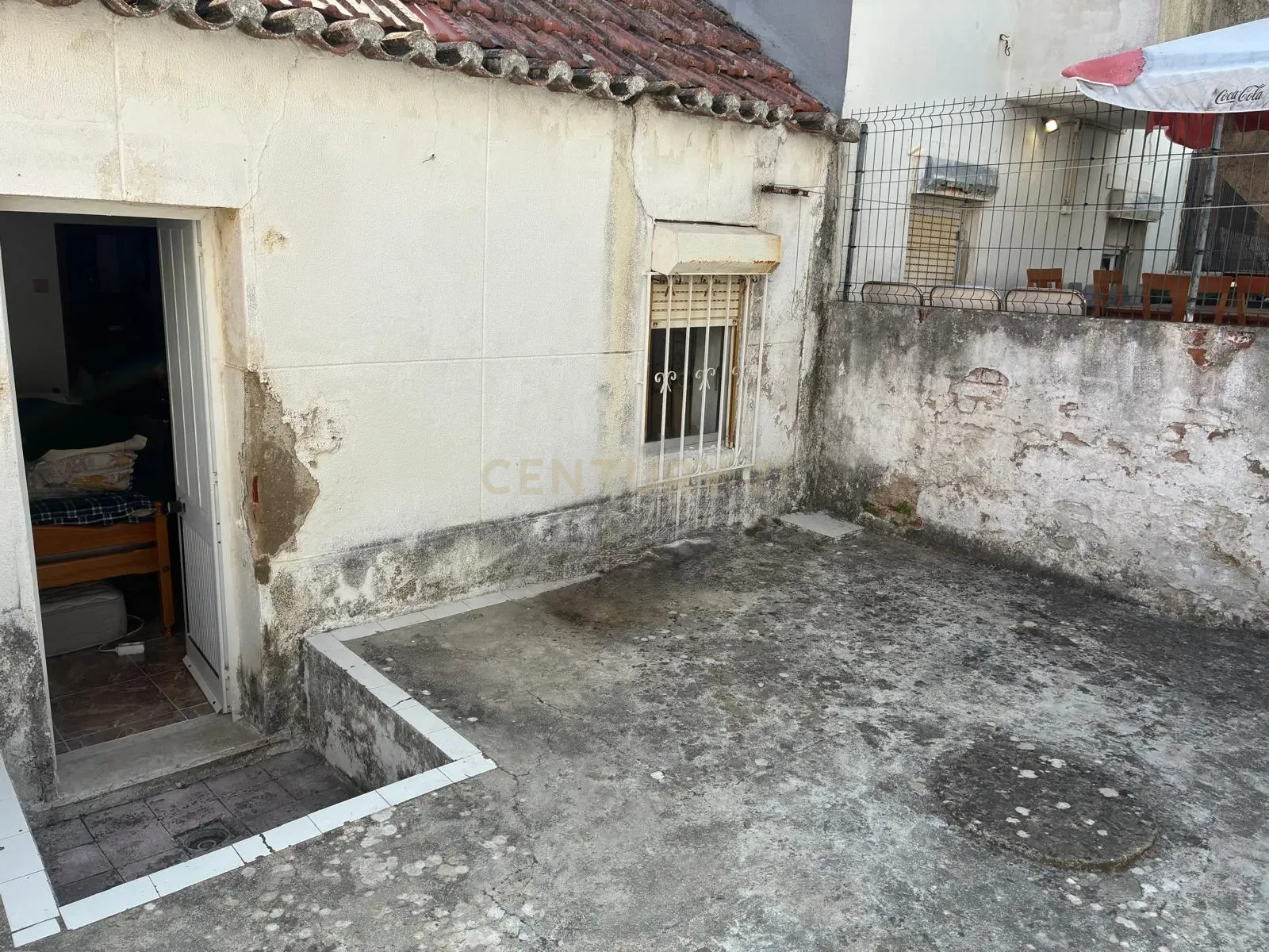 Fotografia 10 de Moradia Térrea com logradouro no centro da Costa da Caparica