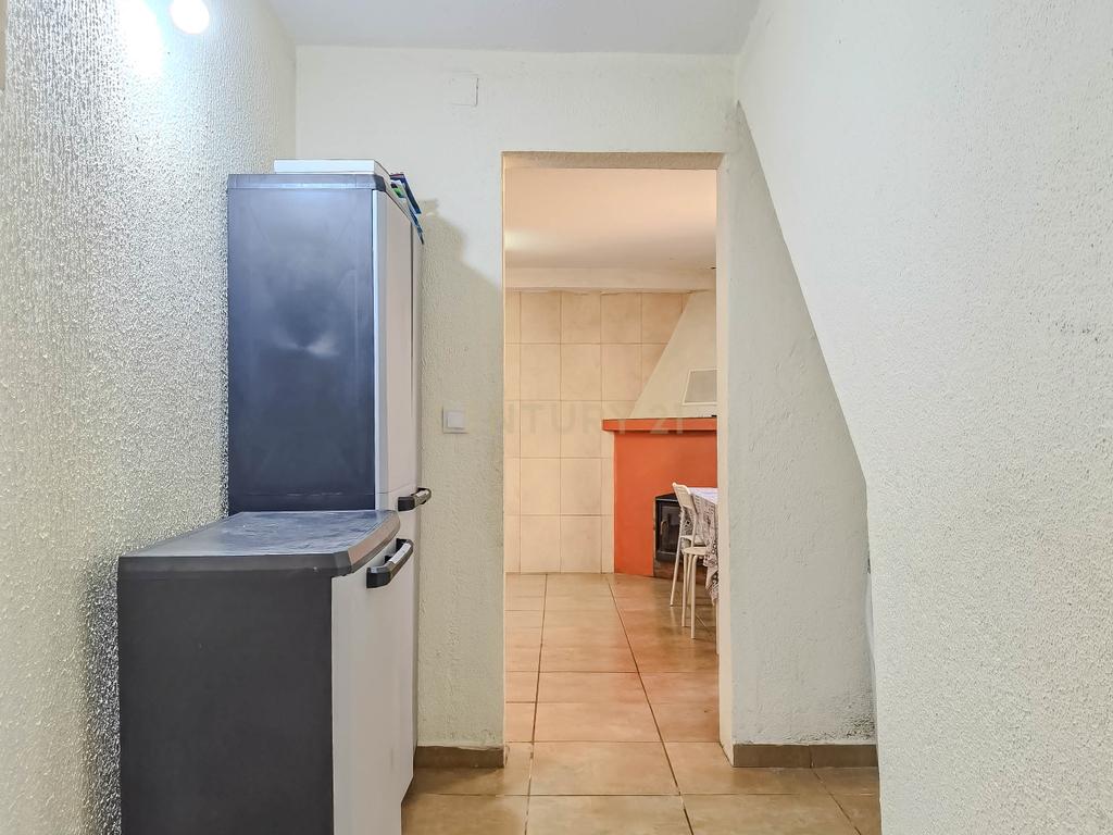 Moradia T2 com 70 m² localizada em Foz Côa, no Largo do Rossio, em pleno Alto Douro Vinhateiro. - Image 15