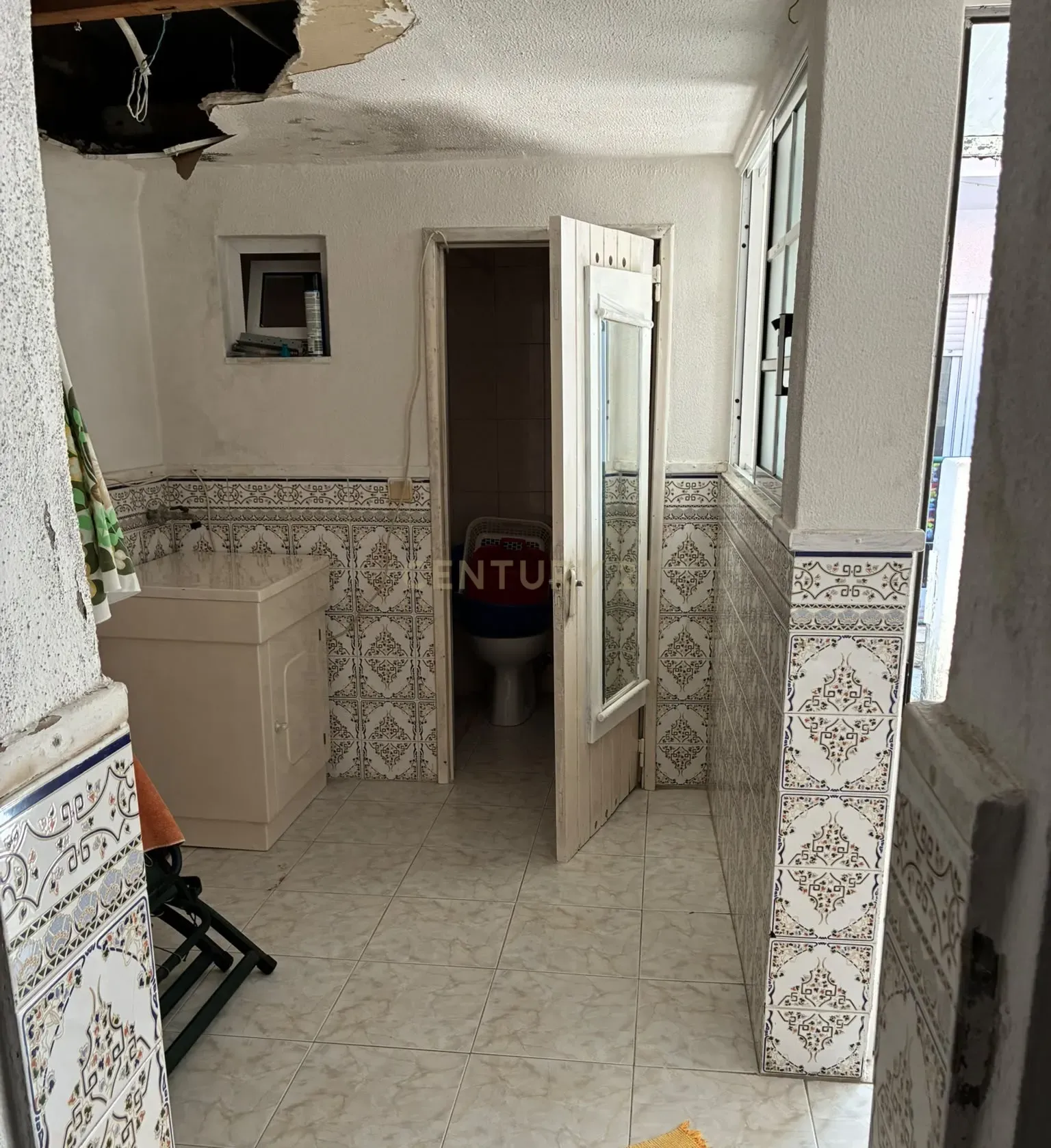 Fotografia 8 de Moradia Térrea com logradouro no centro da Costa da Caparica