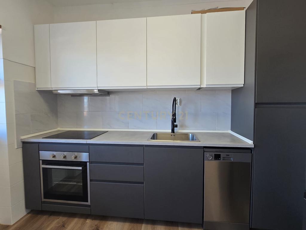 Apartamento T3 transformado em T2 totalmente remodelado no centro de Moura - Image 3