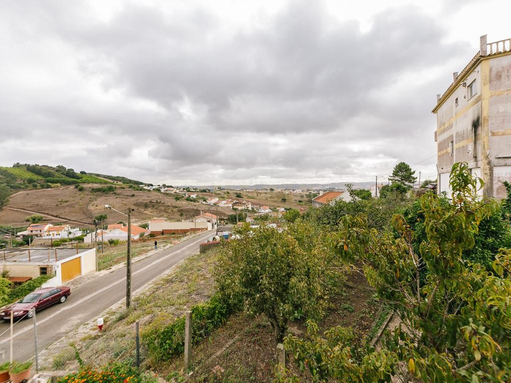 Lote de terreno rústico com uma área de 394m2 e possibilidade de construção de 366m2. - Image 13