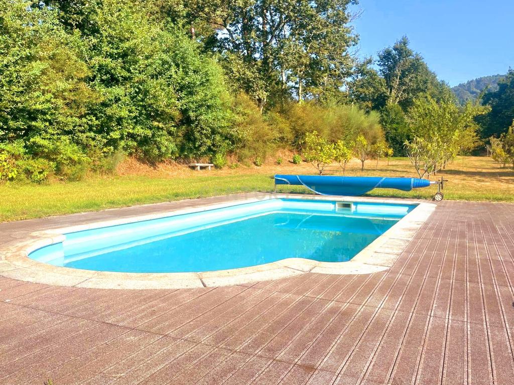 Moradia com quatro quartos  com piscina em Romarigães Paredes de Coura - Image 42